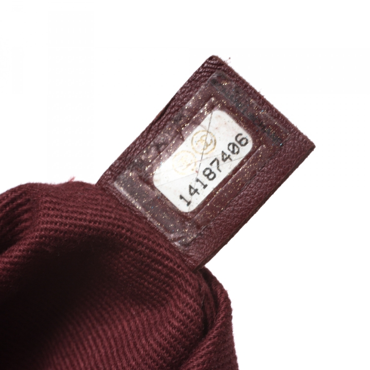 Pre Owned Chanel Brown Floral Embossed Leather Drawstring Bag