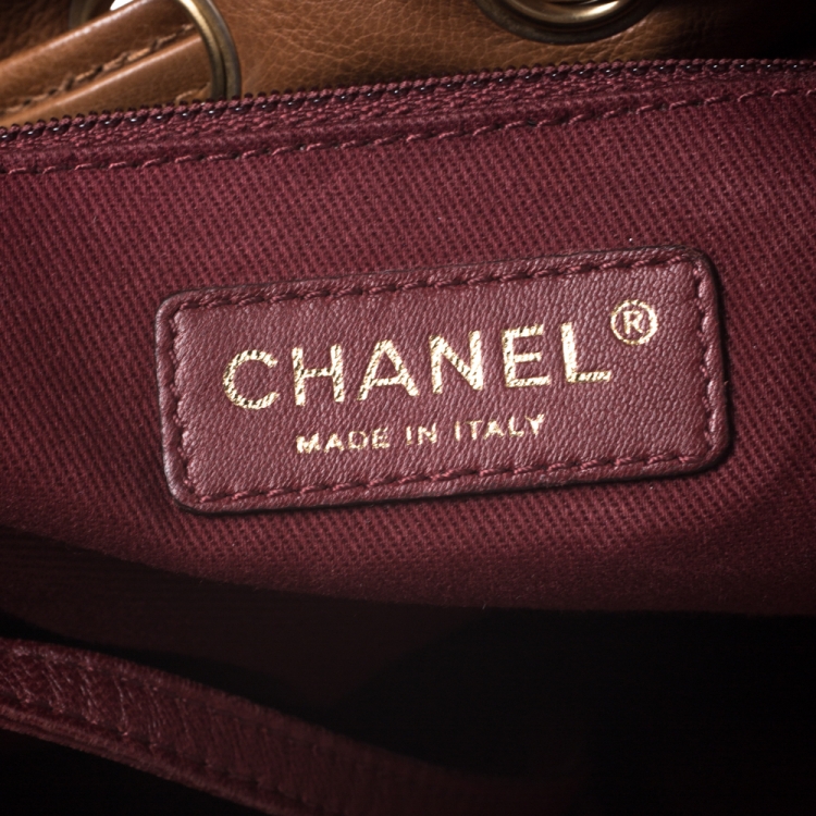 Pre Owned Chanel Brown Floral Embossed Leather Drawstring Bag