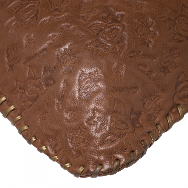 Pre Owned Chanel Brown Floral Embossed Leather Drawstring Bag