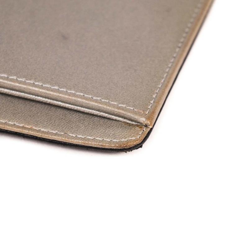 Pre Owned Chanel Black Embossed Leather Camellia Bifold Flap Wallet