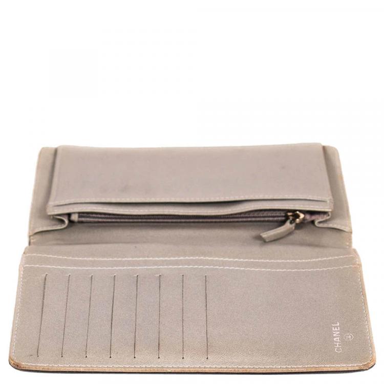 Pre Owned Chanel Black Embossed Leather Camellia Bifold Flap Wallet