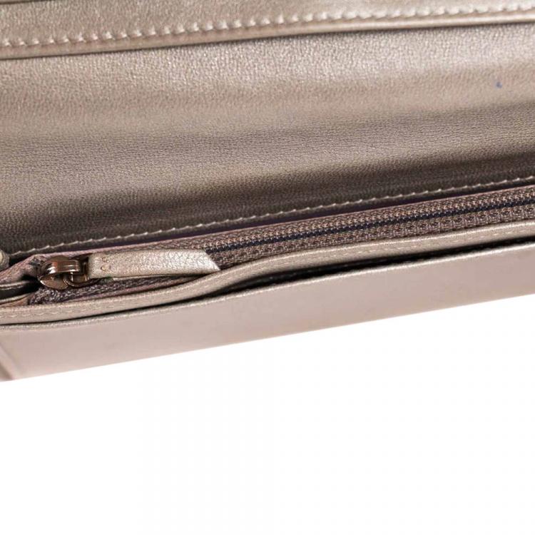 Pre Owned Chanel Black Embossed Leather Camellia Bifold Flap Wallet