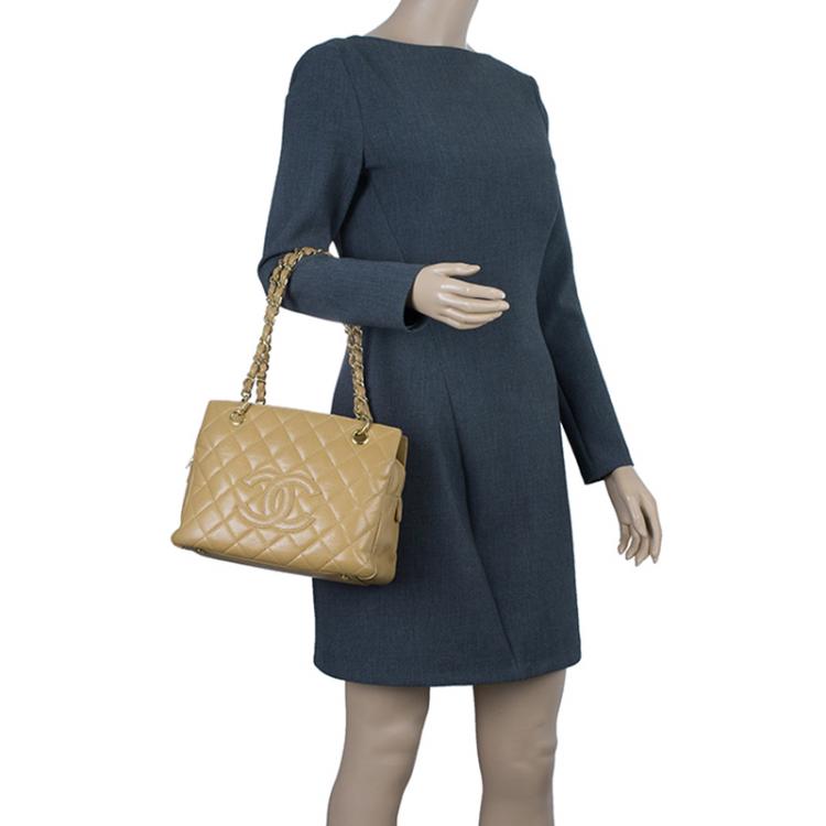 Pre Owned Chanel Beige Quilted Caviar Leather Petite Timeless Shopper Tote