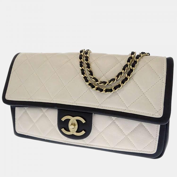 Chanel White/Black Lambskin vintage flap bag Chanel | The Luxury Closet