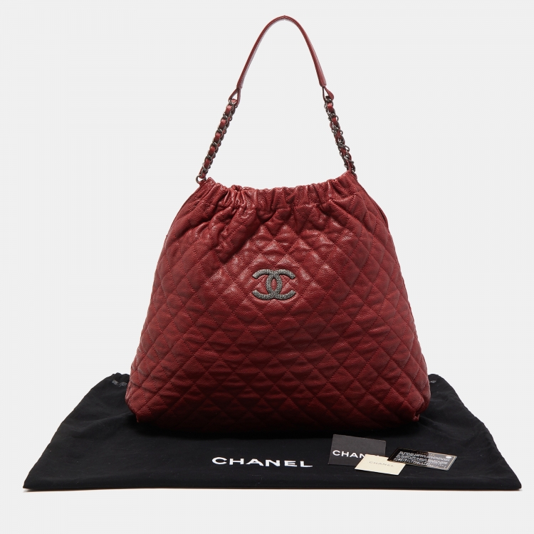 Pre Owned Chanel Red Quilted Caviar Leather CC Drawstring Hobo