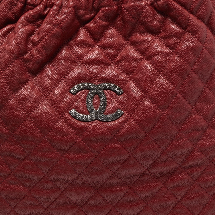 Pre Owned Chanel Red Quilted Caviar Leather CC Drawstring Hobo