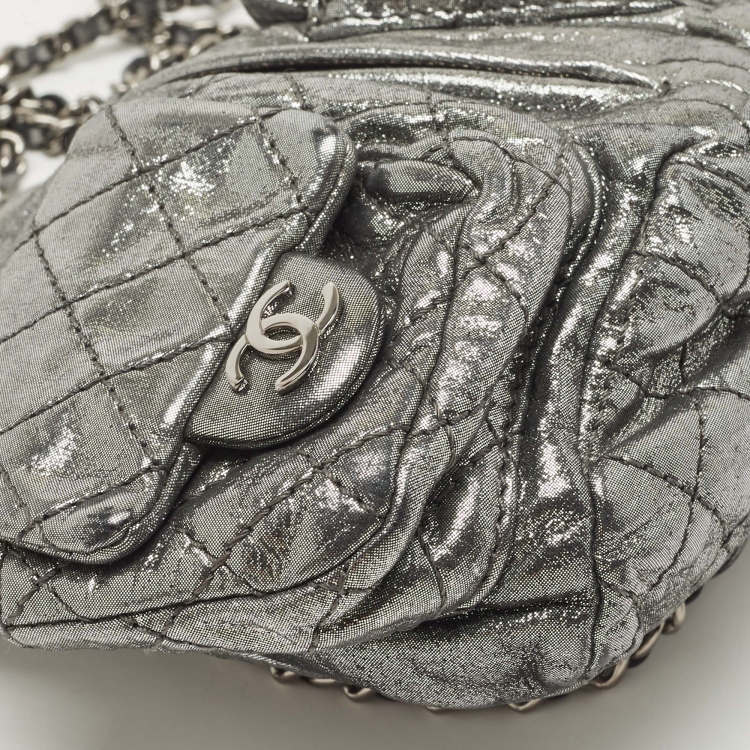 Pre Owned Chanel Silver Shimmer Quilted Leather Mini Backpack Is Back Backpack