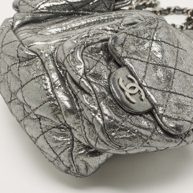 Pre Owned Chanel Silver Shimmer Quilted Leather Mini Backpack Is Back Backpack