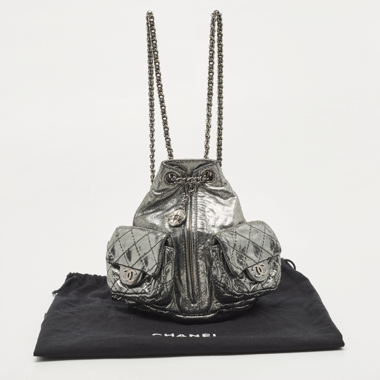 Pre Owned Chanel Silver Shimmer Quilted Leather Mini Backpack Is Back Backpack