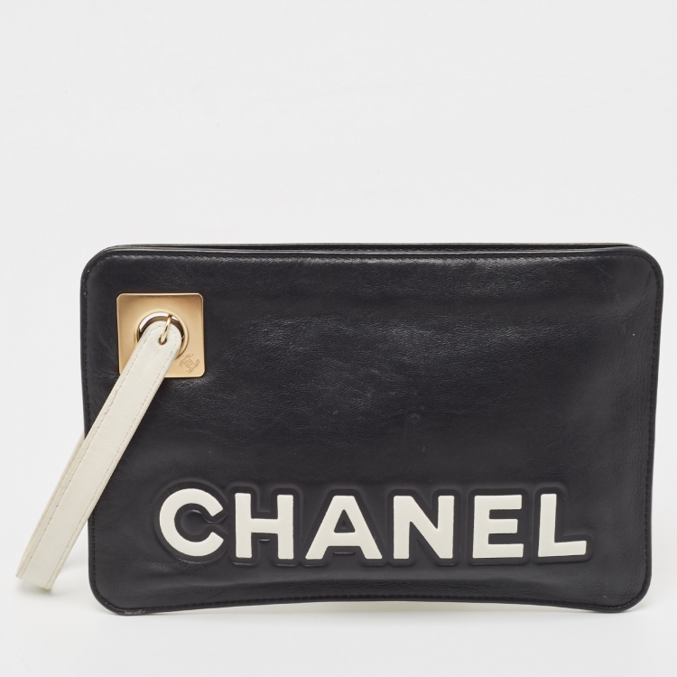 Pre Owned Chanel White/Black Leather Camellia Wristlet Clutch