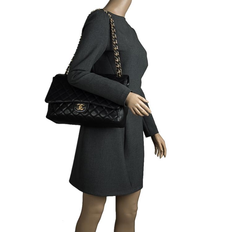 Pre Owned Chanel Black Quilted Caviar Leather Maxi Classic Flap Bag