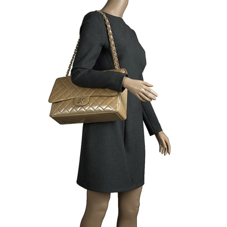 Pre Owned Chanel Beige Quilted Patent Leather Maxi Classic Single Flap Bag