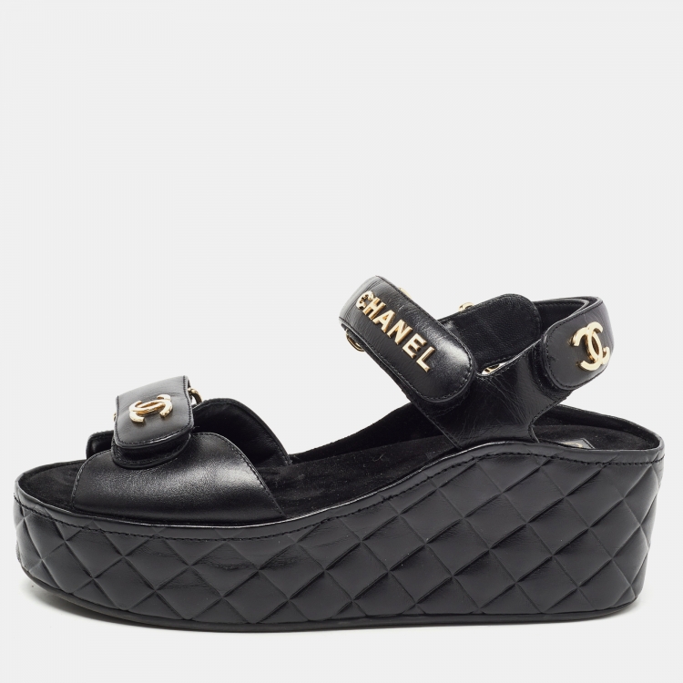 Chanel Black Quilted Leather Logo Wedge Ankle Strap Sandals Size 38 Chanel  | The Luxury Closet