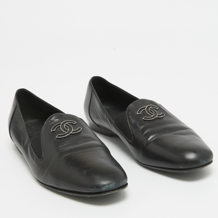 Pre Owned Chanel Black Leather CC Slip On Loafers Size 37.5