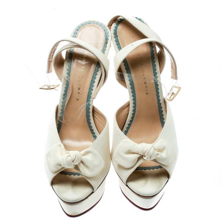 مملوكة مسبقًا Charlotte Olympia Cream Satin Serena Bow Ankle Strap Platform Sandals Size 41