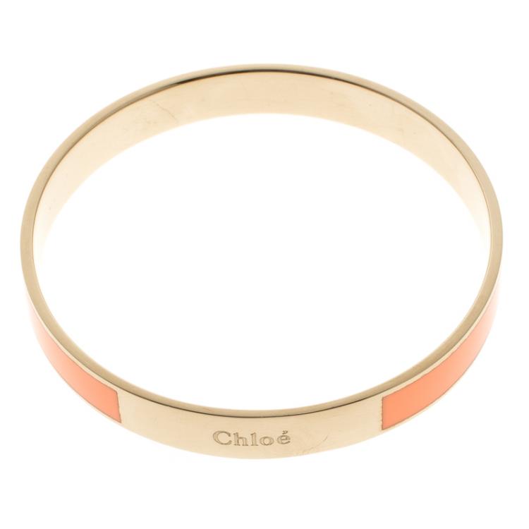 Pre Owned Chloe Holly Peach Enamel Gold Tone Bangle Bracelet S