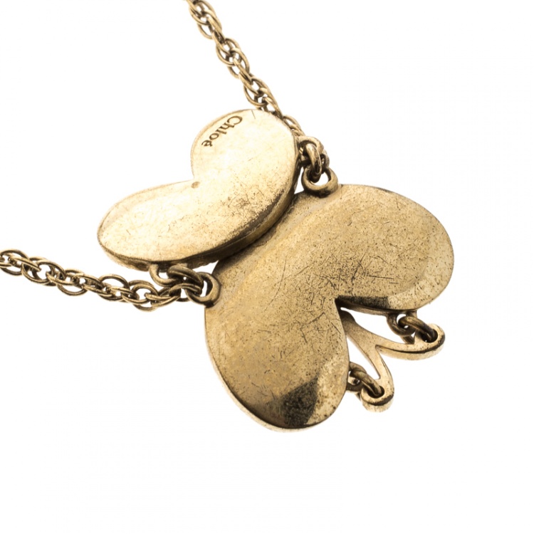 Pre Owned Chloe Cream Enamel Butterfly Gold Tone Charm Bracelet 