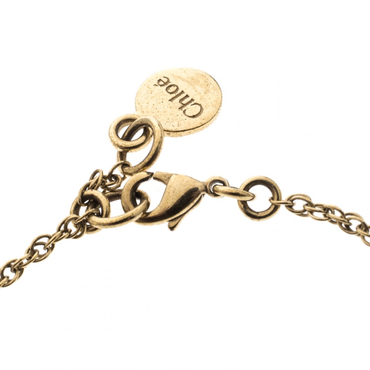 Pre Owned Chloe Cream Enamel Butterfly Gold Tone Charm Bracelet 