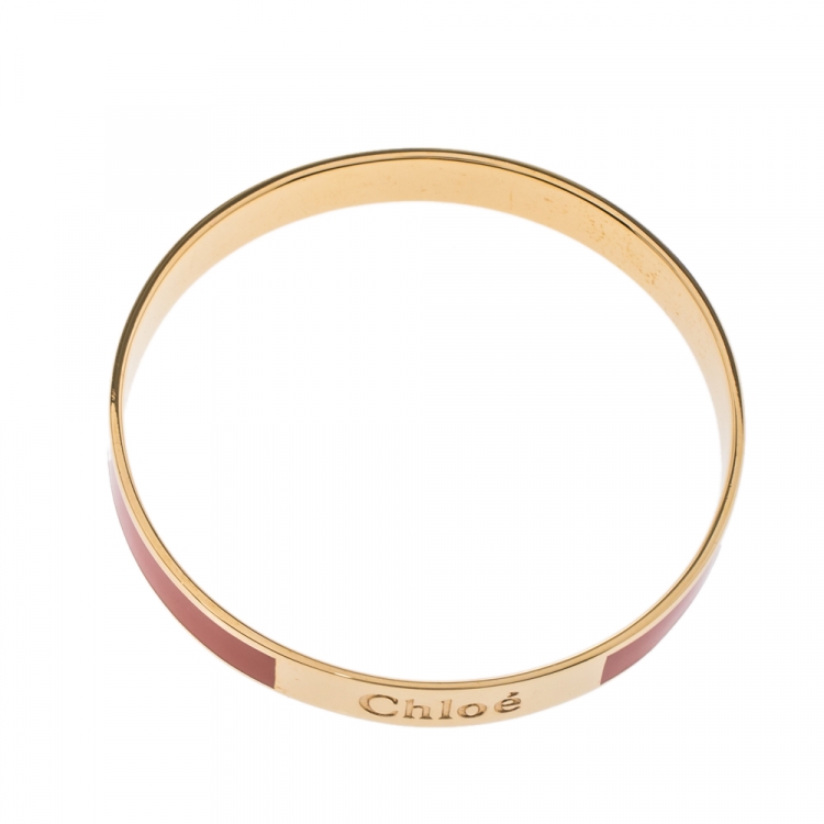 مملوكة مسبقًا Chloé Orange Enamel Gold Tone Holly Bangle Bracelet