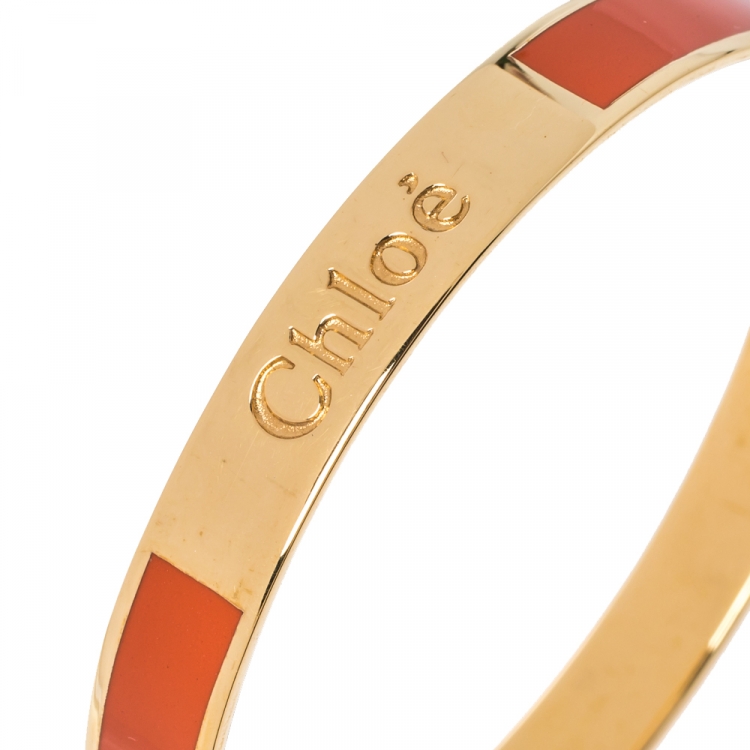 مملوكة مسبقًا Chloé Orange Enamel Gold Tone Holly Bangle Bracelet