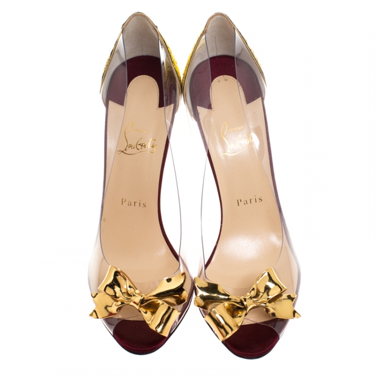 مملوكة مسبقًا Christian Louboutin Metallic Gold Python Embossed Leather and PVC Justinodo Bow Peep Toe Pumps Size 41