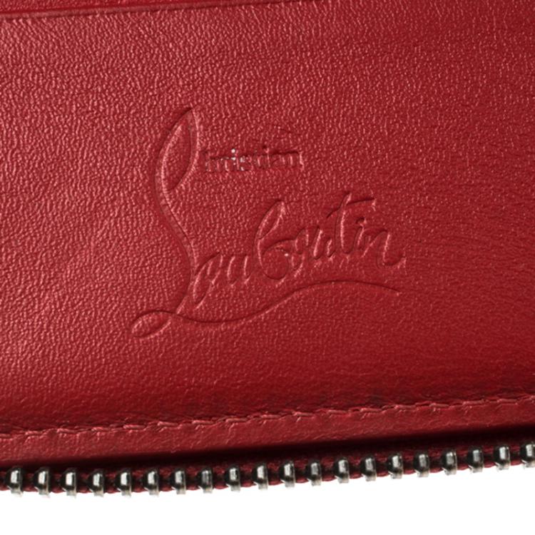 مملوكة مسبقًا Christian Louboutin Red Leather Spiked Zip Around Wallet