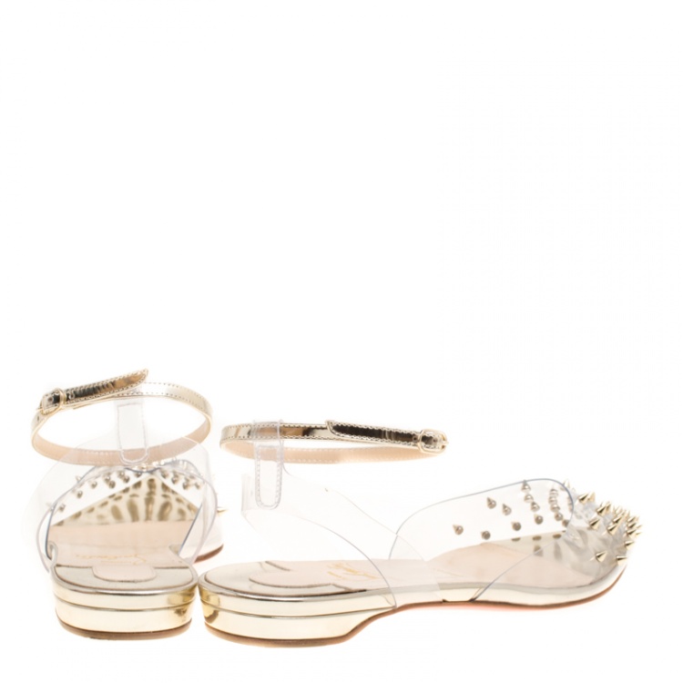Pre Owned Christian Louboutin PVC and Metallic Gold Leather Spikoo Ankle Strap Pointed Toe Flats Size 36.5
