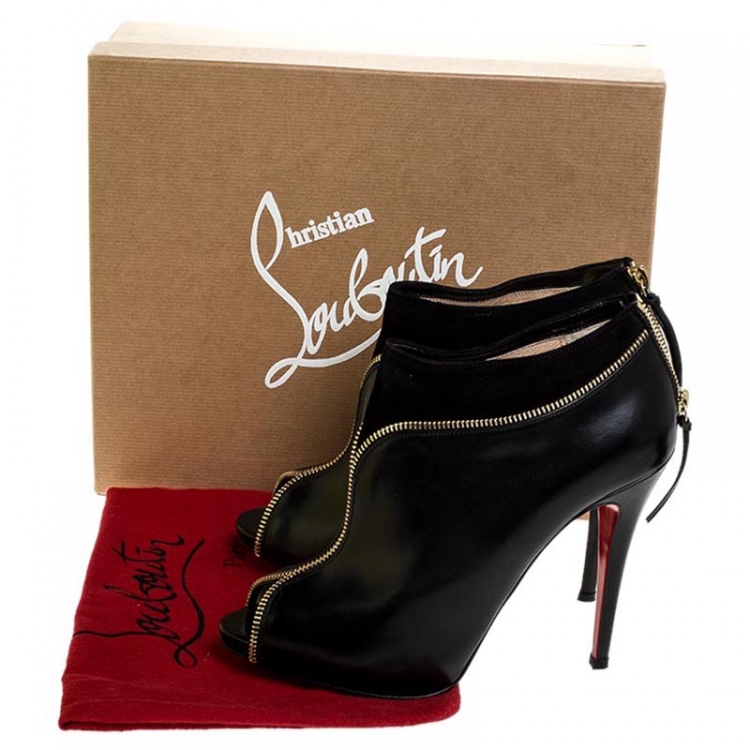 Pre Owned Christian Louboutin Black Leather and Suede Col Zippe Ankle Boots Size 41