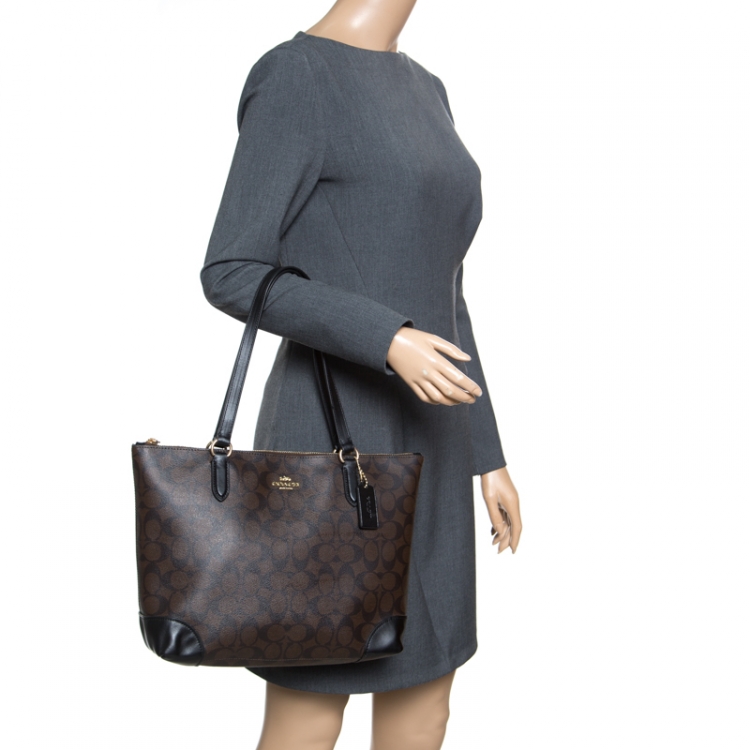 Pre Owned Coach Brown/Black Signature Coated Canvas Shopper Tote