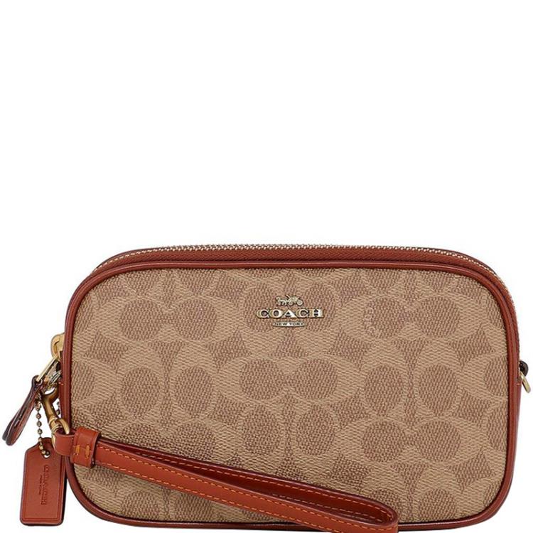 Coach sadie crossbody on sale in signature canvas