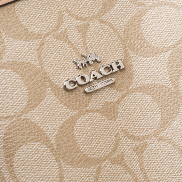 Pre Owned Coach Pink/Beige Floral Print And Signature Coated Canvas Reversible City Tote