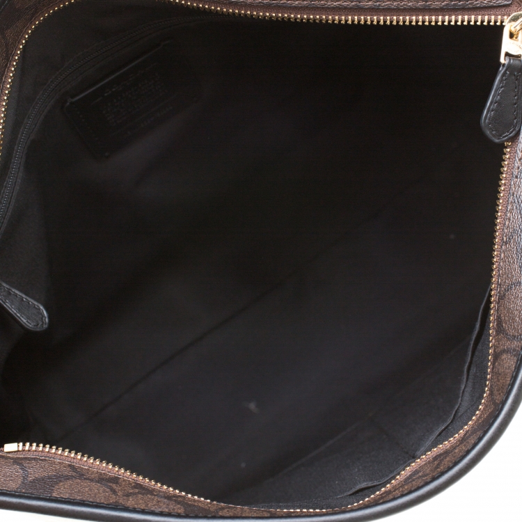 Pre Owned Coach Brown/Black Signature Coated Canvas City Zip Tote