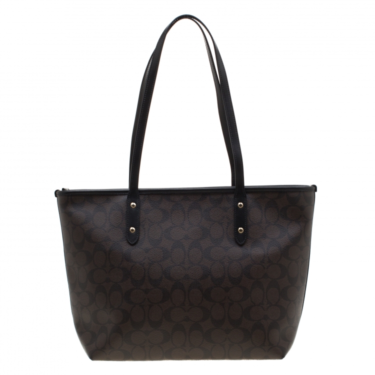 Pre Owned Coach Brown/Black Signature Coated Canvas City Zip Tote