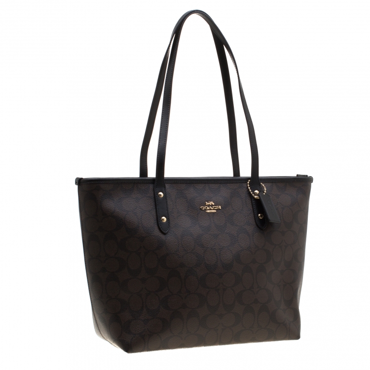 Pre Owned Coach Brown/Black Signature Coated Canvas City Zip Tote