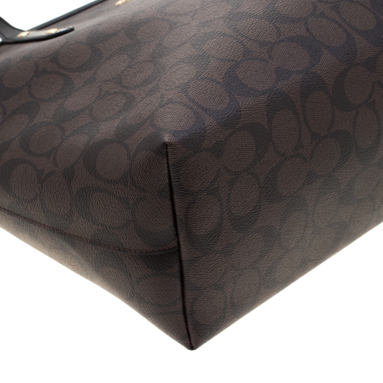 Pre Owned Coach Brown/Black Signature Coated Canvas City Zip Tote