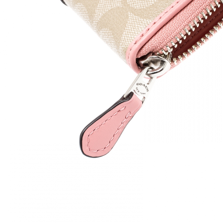 Pre Owned  Coach Beige/Pink Signature PVC and Leather Accordion Zip Around Wallet