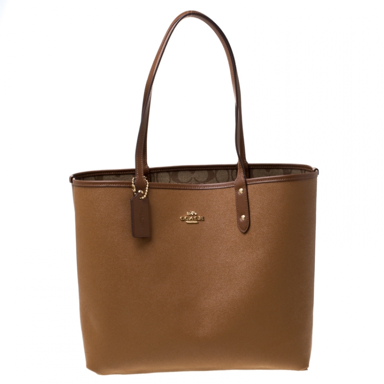Pre Owned Coach Brown Signature Coated Canvas and Leather Reversible City Tote