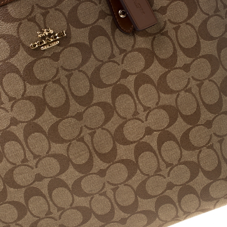 Pre Owned Coach Brown Signature Coated Canvas and Leather Reversible City Tote