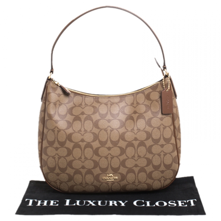 Pre Owned Coach Brown Signature Coated Canvas and Leather Zip Hobo