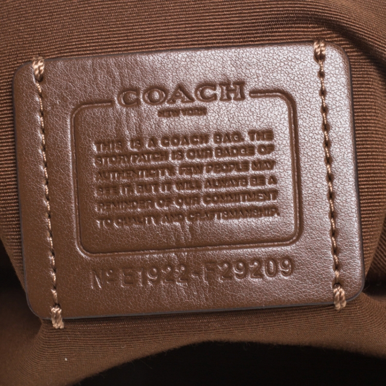 Pre Owned Coach Brown Signature Coated Canvas and Leather Zip Hobo