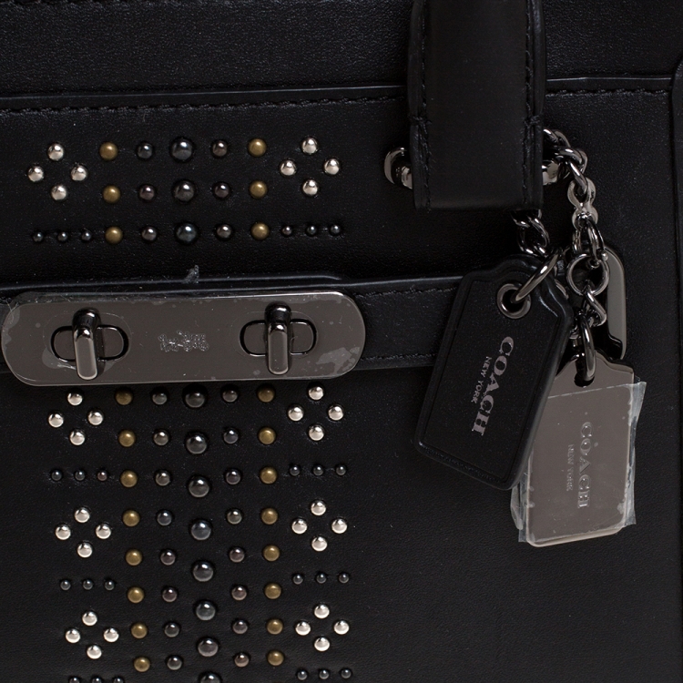 black studded coach purse