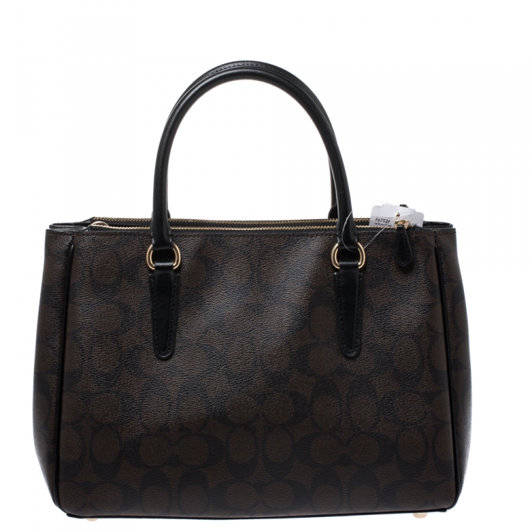 Pre Owned Coach Brown/Black Signature Coated Canvas  Surrey Carryall Tote