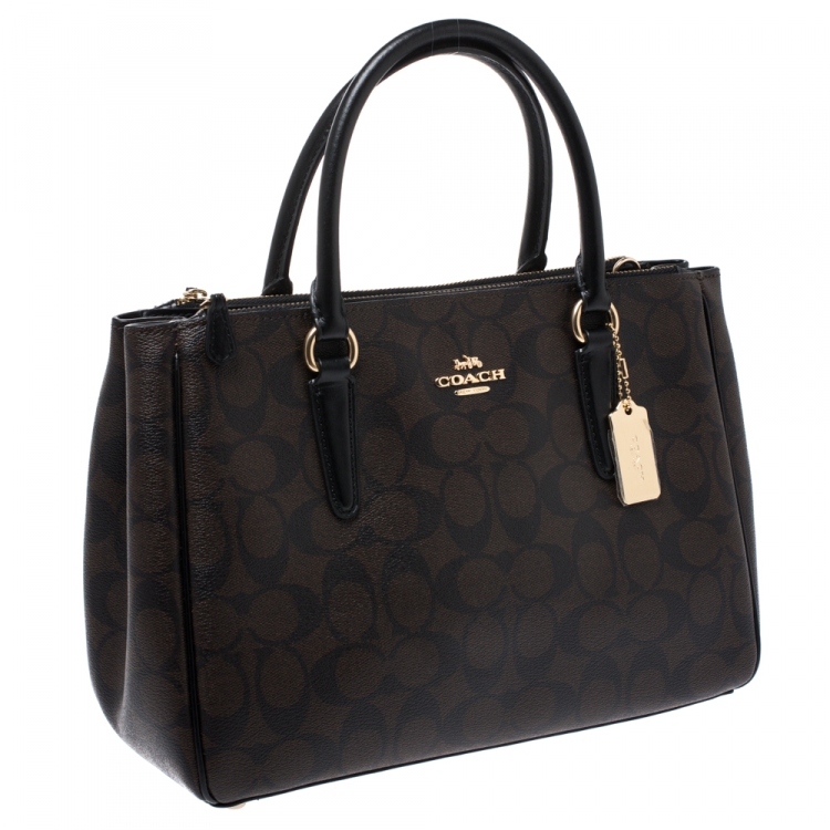 Pre Owned Coach Brown/Black Signature Coated Canvas  Surrey Carryall Tote