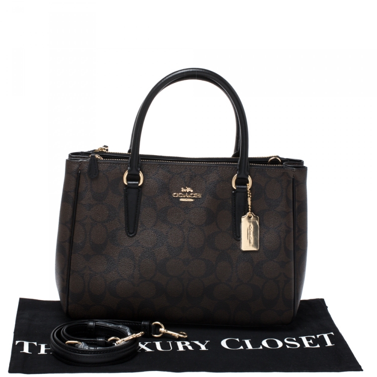 Pre Owned Coach Brown/Black Signature Coated Canvas  Surrey Carryall Tote