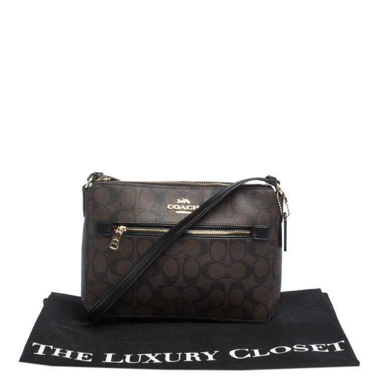 Pre Owned Coach Brown/Black Signature Coated Canvas and Leather Crossbody Bag