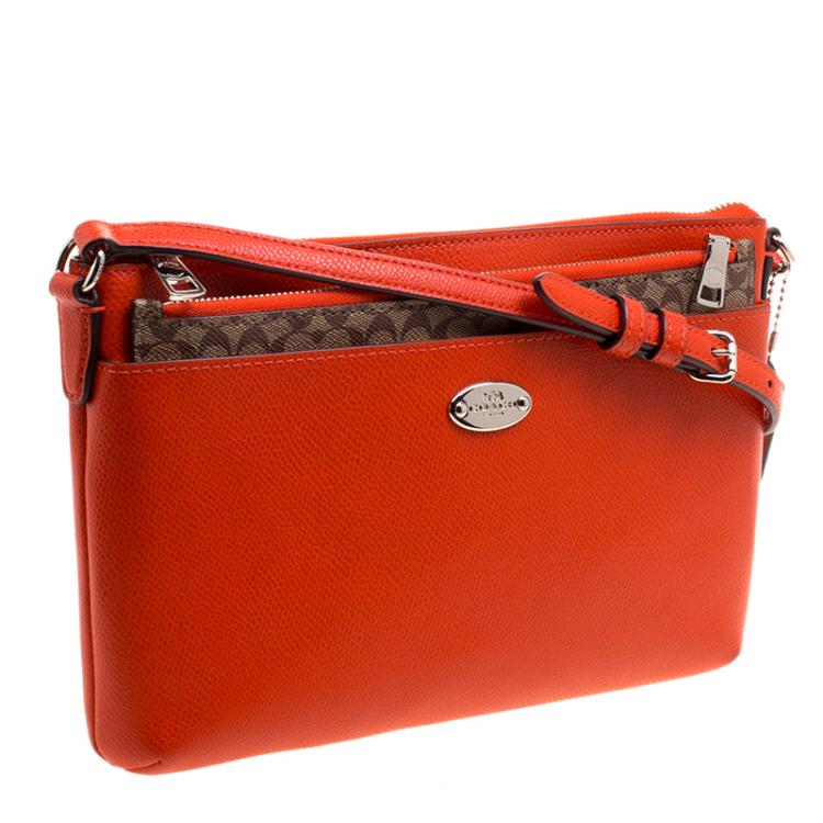 Pre Owned Coach Orange Leather East/West Pop Up Pouch Crossbody Bag