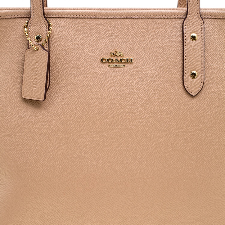 Pre Owned Coach Peach Leather City Zip Tote