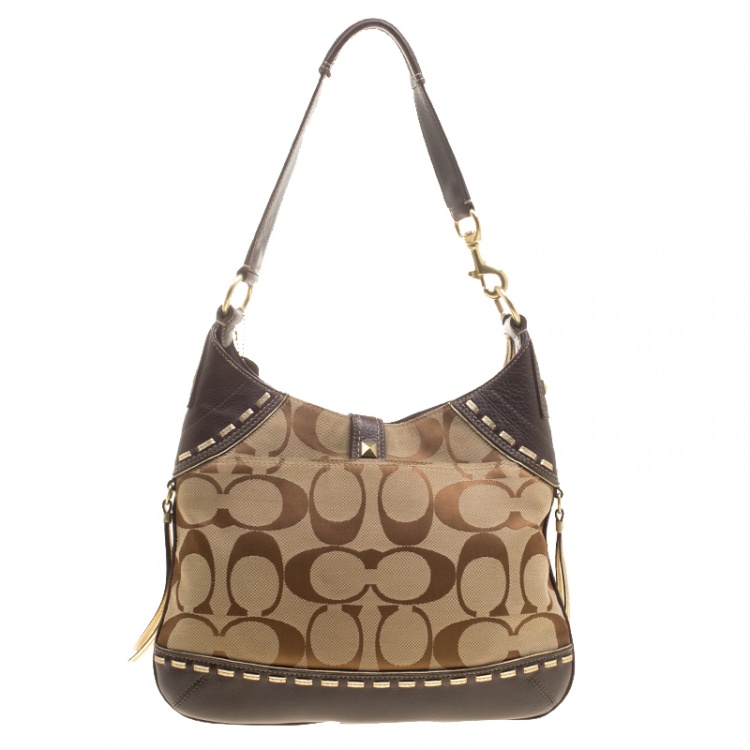 Pre Owned Coach Beige/Brown Signature Canvas and Leather Hobo