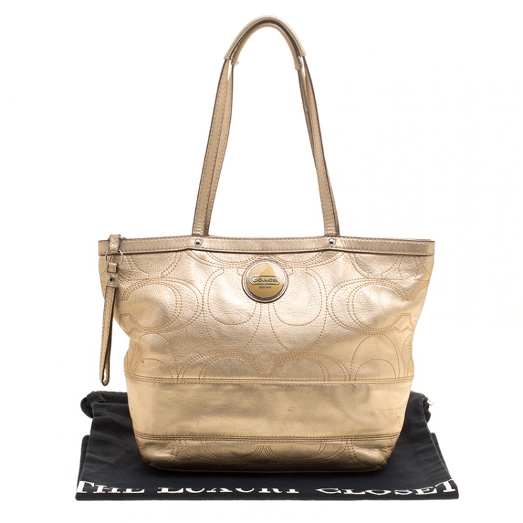 coach gold handbag