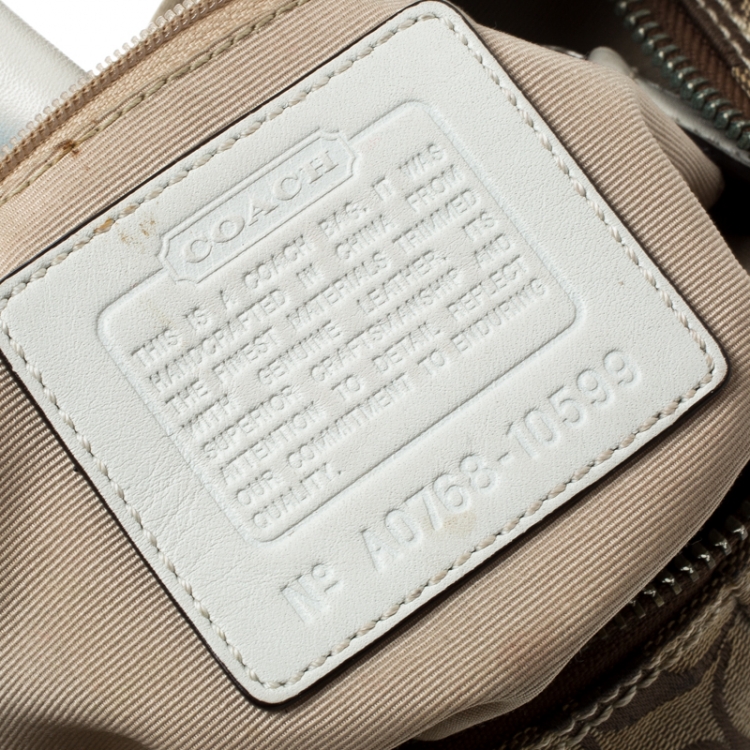 Pre Owned Coach Beige/Off White Signature Canvas Hobo